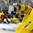 GRAND FORKS, NORTH DAKOTA - APRIL 23: Sweden's Filip Gustavsson #1, Oskar Steen #20 and Canada's David Quenneville #18 get tangled up at the net during semifinal round action at the 2016 IIHF Ice Hockey U18 World Championship. (Photo by Matt Zambonin/HHOF-IIHF Images)

